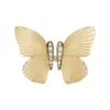 Colección Sutton Butterfly Anillo central focal de acero inoxidable dorado Colección Sutton Butterfly Anillo central focal de acero inoxidable dorado