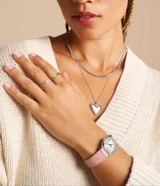 Collar Sutton Legacy Heart con colgante giratorio de acero inoxidable