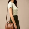 Mini bolso de cuero Carlie Mini bolso de cuero Carlie