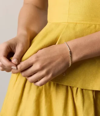 Pulsera de tenis con eslabones en forma de corazón de latón dorado Sutton Love-All