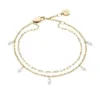 Pulsera Ellis Shaky Glitz de acero inoxidable dorado con múltiples hilos Pulsera Ellis Shaky Glitz de acero inoxidable dorado con múltiples hilos
