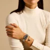 Raquel Reloj y brazalete de acero inoxidable bicolor con tres agujas y fecha Raquel Reloj y brazalete de acero inoxidable bicolor con tres agujas y fecha